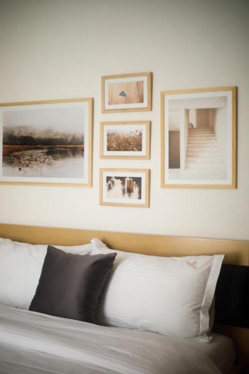 Postel nebo postele na pokoji v ubytování Triss Hotel