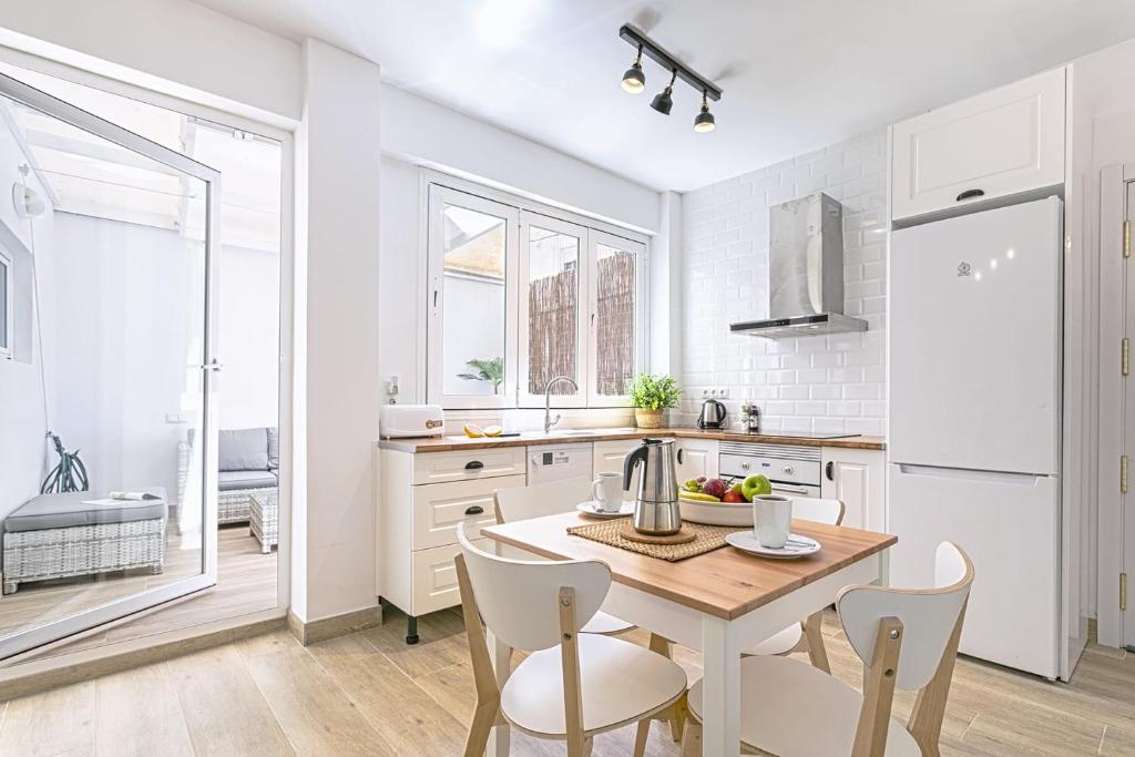 Kuchyň nebo kuchyňský kout v ubytování Precioso apartamento con Patio