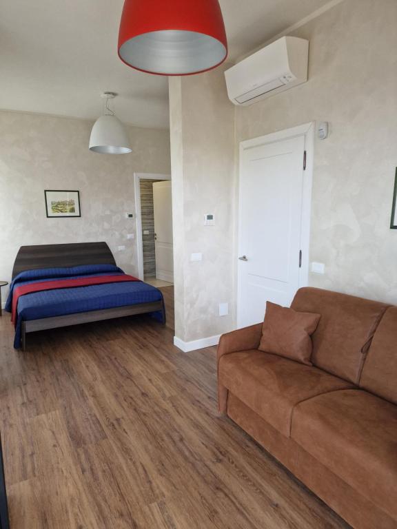 B&B A due passi dal Lago - Triple Chambre Avec Balcon