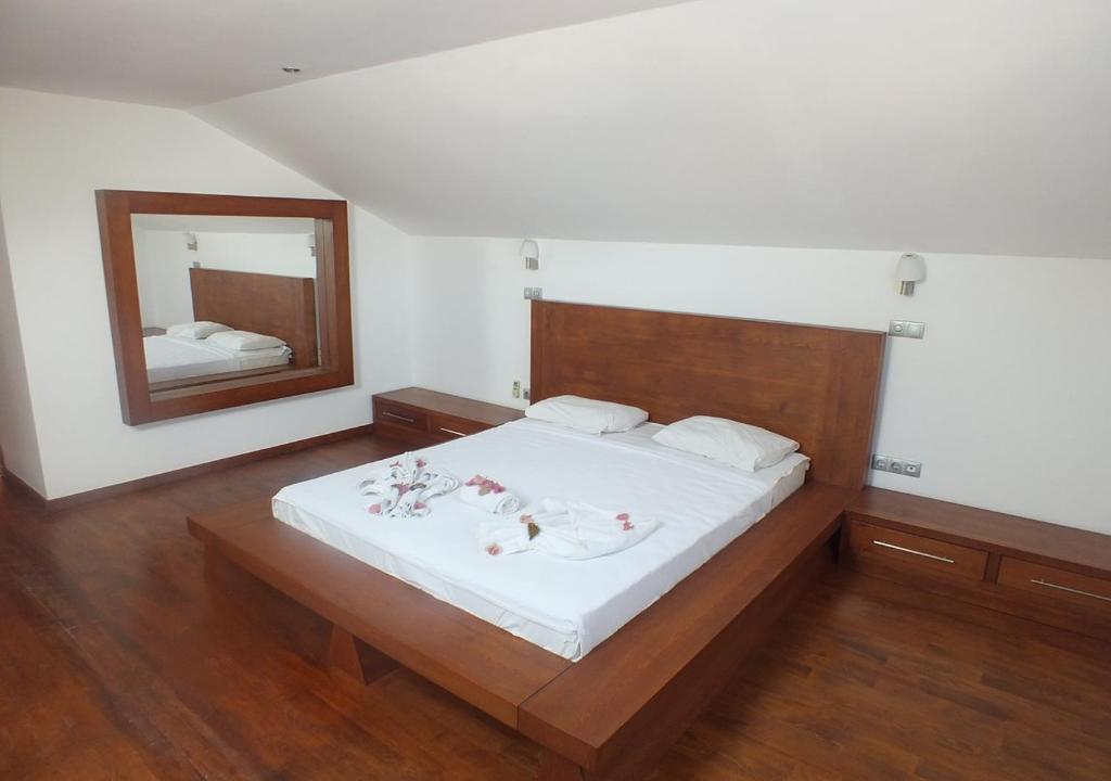 Postel nebo postele na pokoji v ubytování HİLLCREST DUBLEX APART