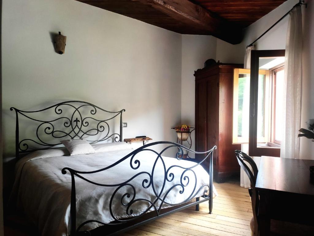 A bed or beds in a room at B&B I Martelli