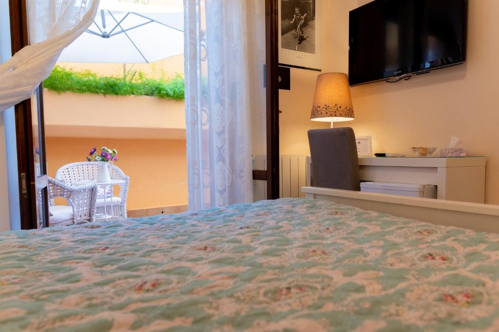 Postel nebo postele na pokoji v ubytování B&B Le Sorelle