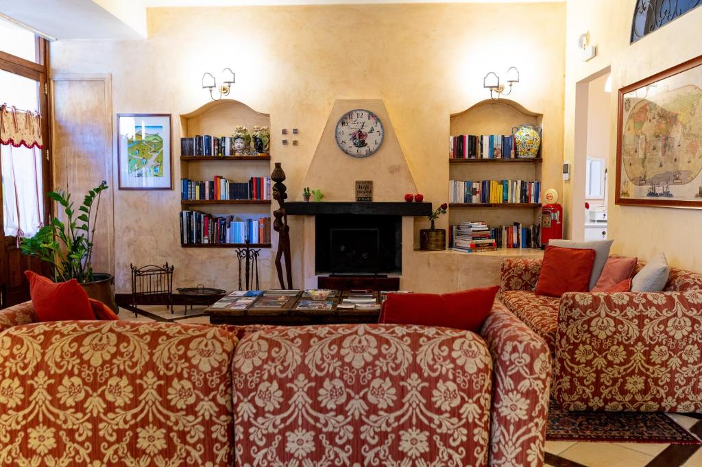 TV a/nebo společenská místnost v ubytování B&B Le Sorelle