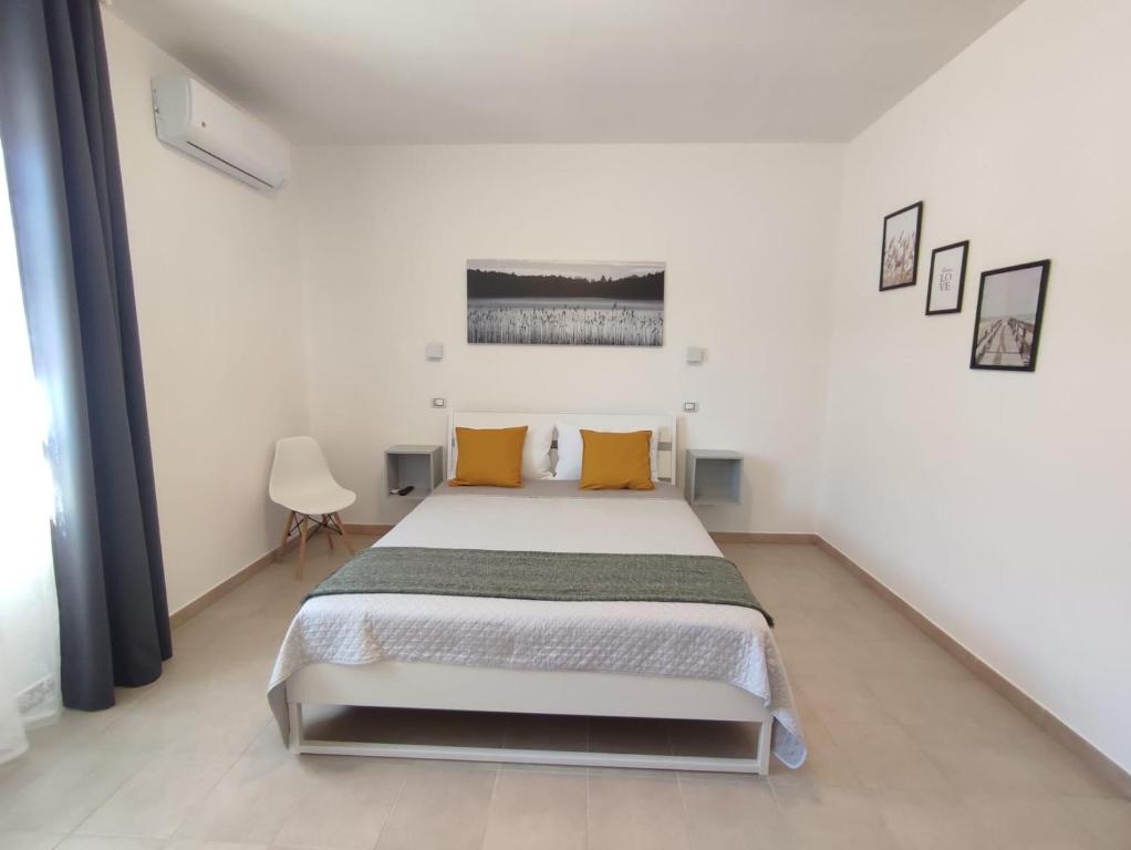 Posteľ alebo postele v izbe v ubytovaní Cristian Rooms