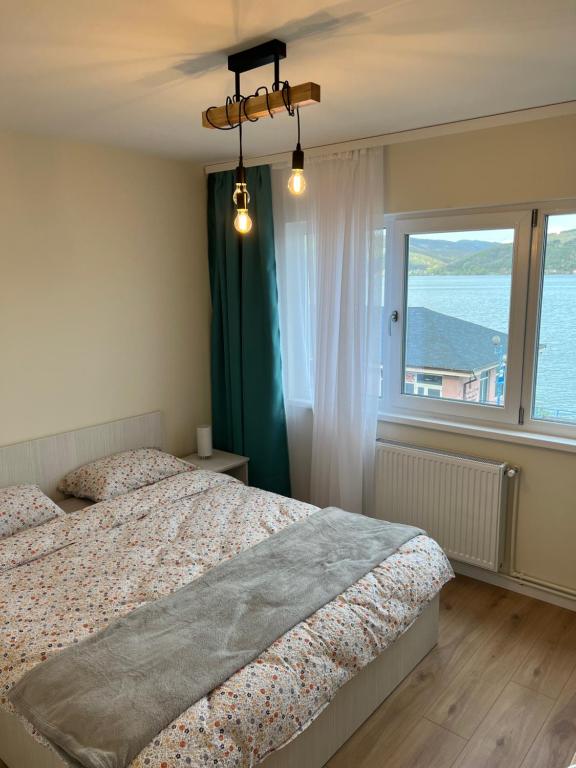 Postel nebo postele na pokoji v ubytování GuestHouse Mili