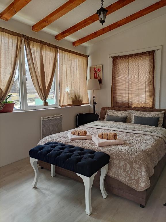 Ένα ή περισσότερα κρεβάτια σε δωμάτιο στο Apartments Baron Žabljak