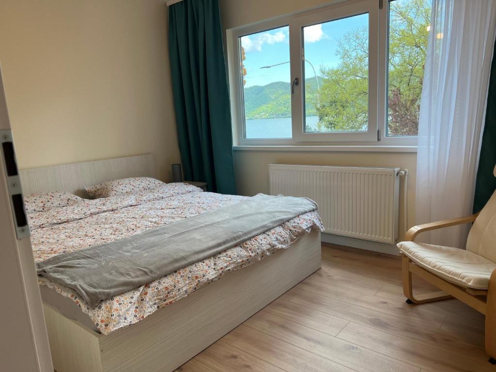 Postel nebo postele na pokoji v ubytování GuestHouse Mili
