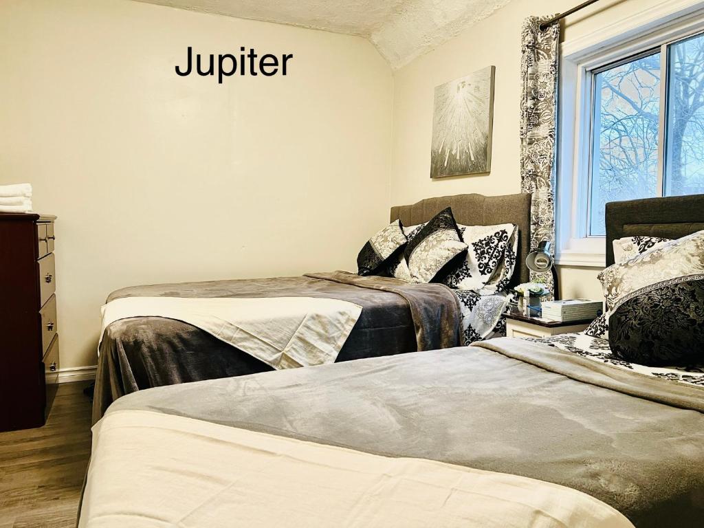 Voodi või voodid majutusasutuse Cheerful residence toas