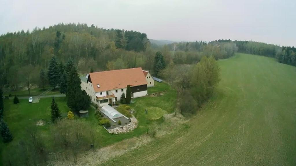 an aerial view of a house in a field at Ferienwohnung Raabsteine in Bad Gottleuba