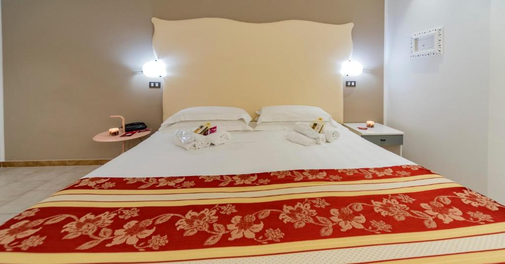 Postel nebo postele na pokoji v ubytování El Patio Hotel