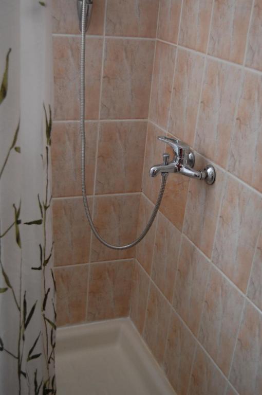 Koupelna v ubytování Hotel Bucegi Portile Regatului