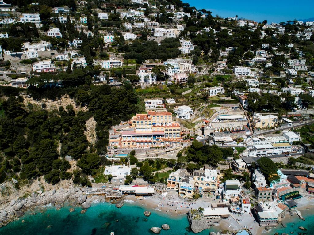 an aerial view of a town on a mountain at Hotel Weber Ambassador in Capri