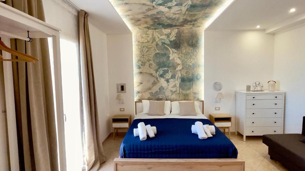 Postel nebo postele na pokoji v ubytování Casa P. Greco