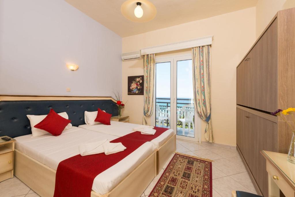 Postel nebo postele na pokoji v ubytování Fedra Hotel
