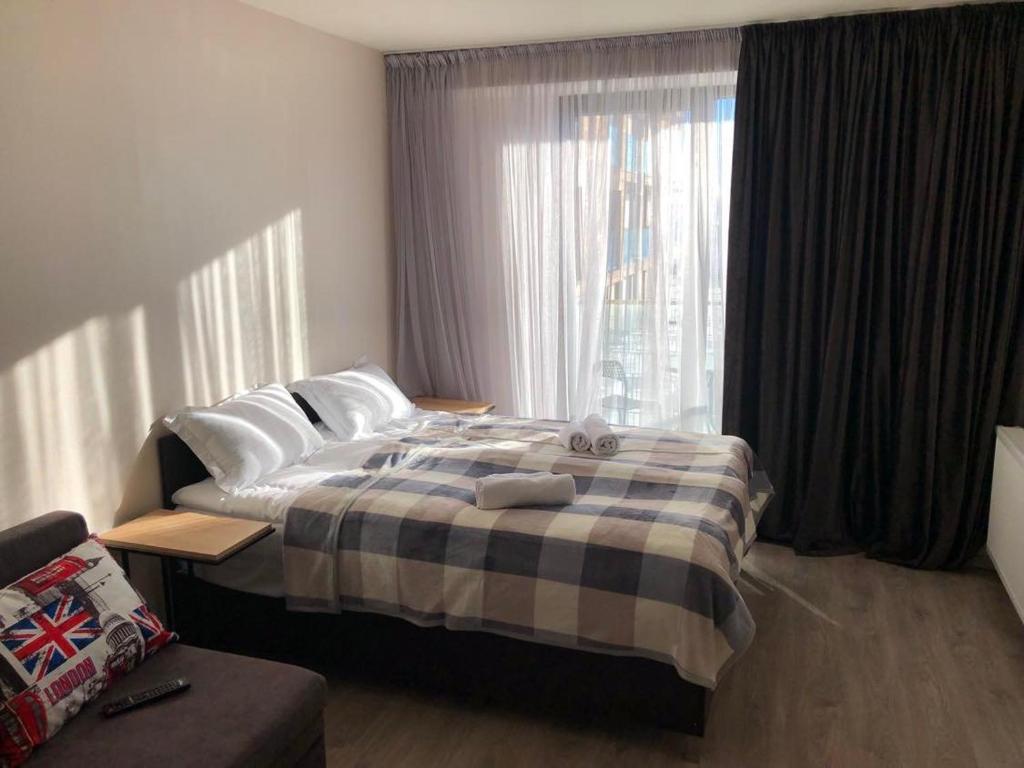 Ένα ή περισσότερα κρεβάτια σε δωμάτιο στο New Gudauri, Loft 2, #203