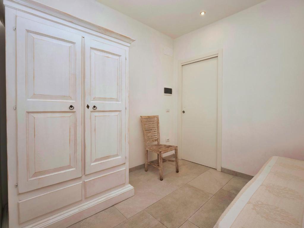 Łóżko lub łóżka w pokoju w obiekcie Iside Accommodations