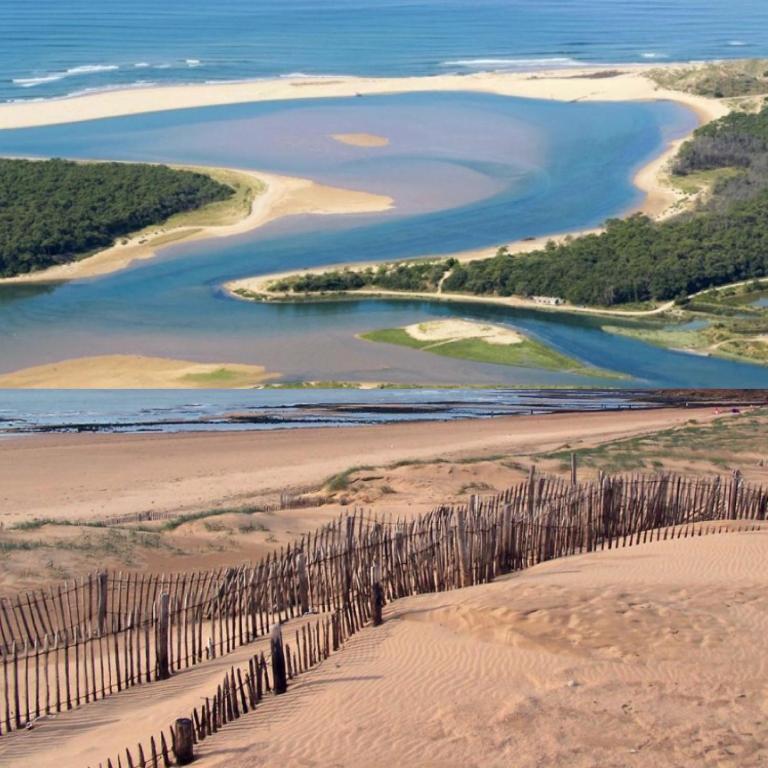 an aerial view of a beach with a fence at Appartement vue sur mer in Talmont