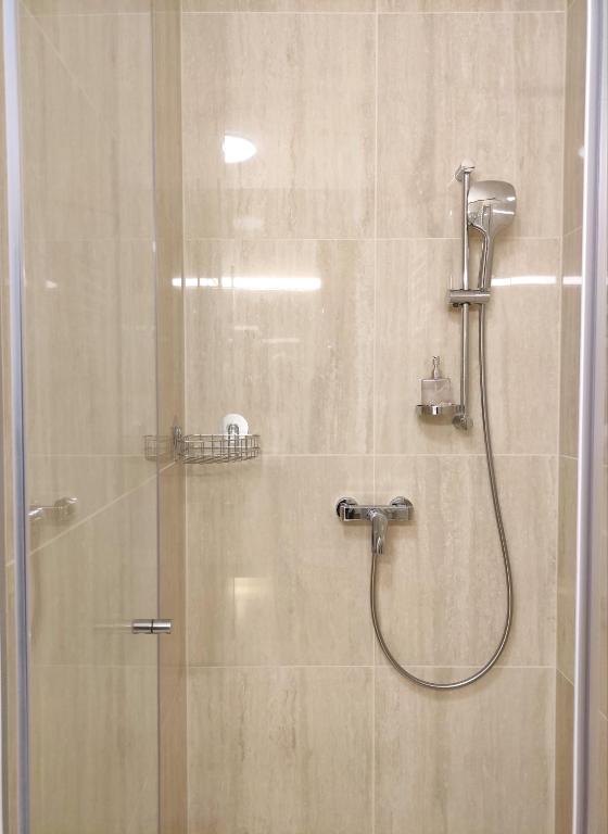 Kúpeľňa v ubytovaní Spa Residence Carbona EmDoNa Luxury Apartment