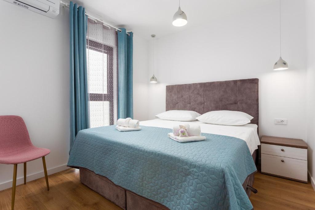Posteľ alebo postele v izbe v ubytovaní Villa Mare's 2