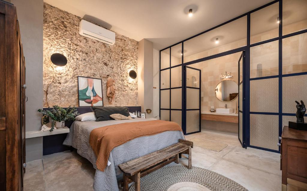 Postel nebo postele na pokoji v ubytování Casona Origen Merida