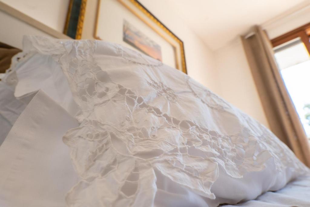 Postel nebo postele na pokoji v ubytování Missipezza Residence a Frassanito