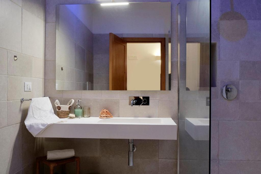 Koupelna v ubytování Missipezza Residence a Frassanito