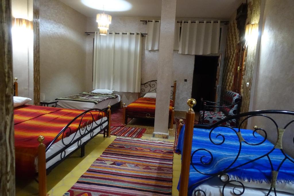 Postel nebo postele na pokoji v ubytování Maison Vallée Du Ziz