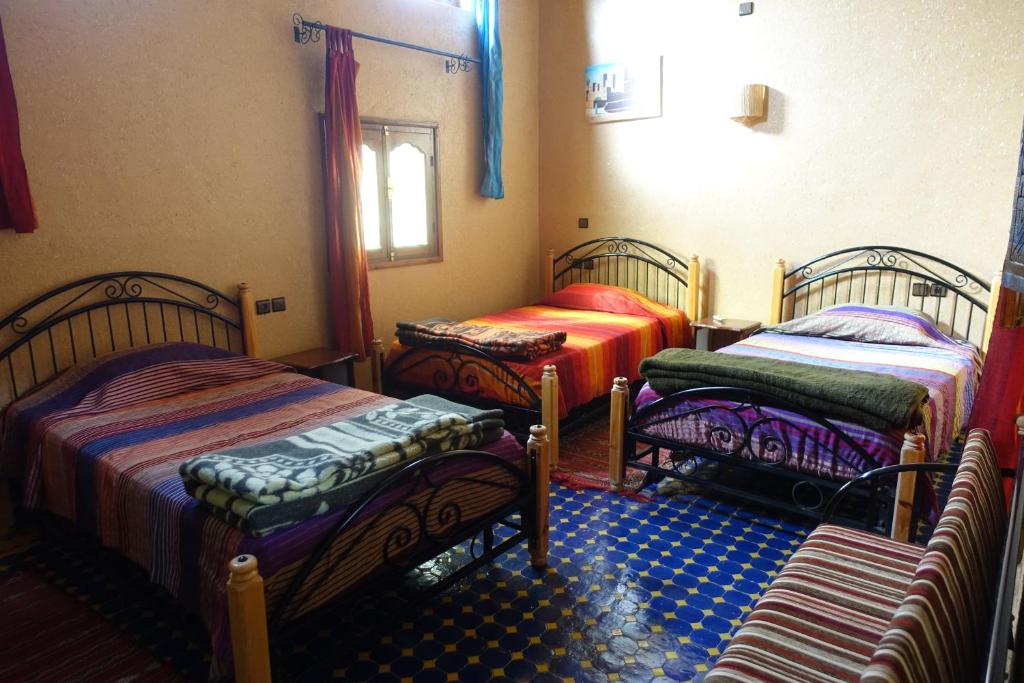 Postel nebo postele na pokoji v ubytování Maison Vallée Du Ziz