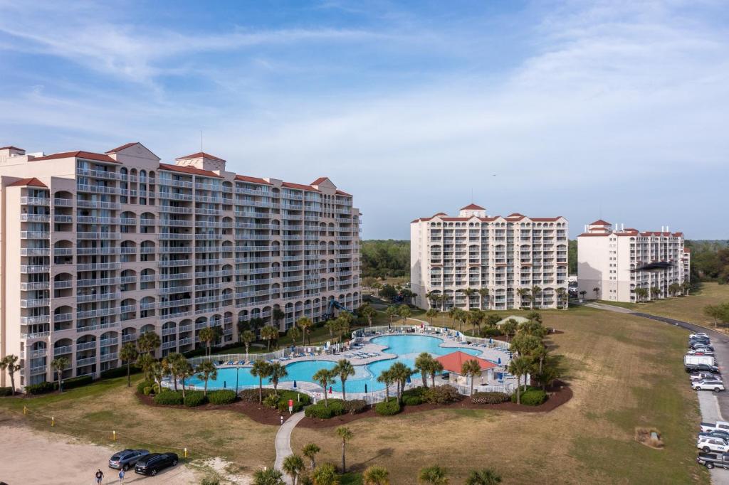 an aerial view of a resort with a pool at Yacht Club Villas #2-504 condo in Myrtle Beach