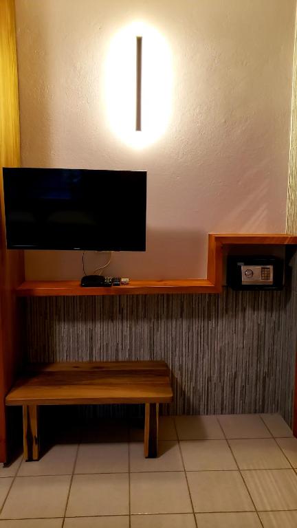 TV a/nebo společenská místnost v ubytování Sunrise Club Hotel