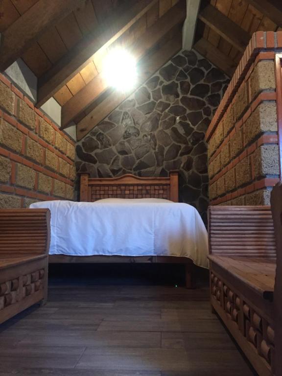 Postel nebo postele na pokoji v ubytování Hotel La Condesa