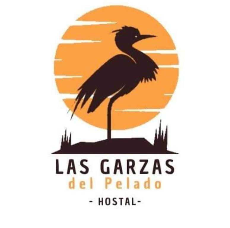 een logo voor het ziekenhuis las garças el palapa bij Hostal LAS GARZAS DEL PELADO in Playas