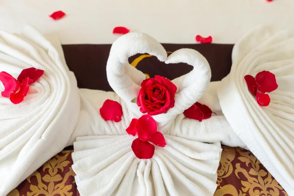 Postel nebo postele na pokoji v ubytování Centre Hotel