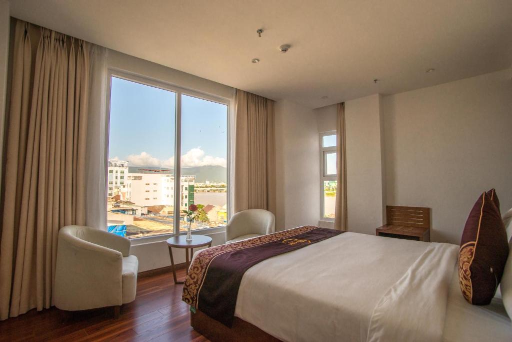 Postel nebo postele na pokoji v ubytování Centre Hotel