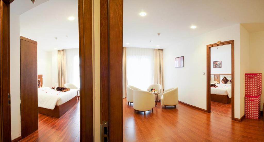 Postel nebo postele na pokoji v ubytování Centre Hotel