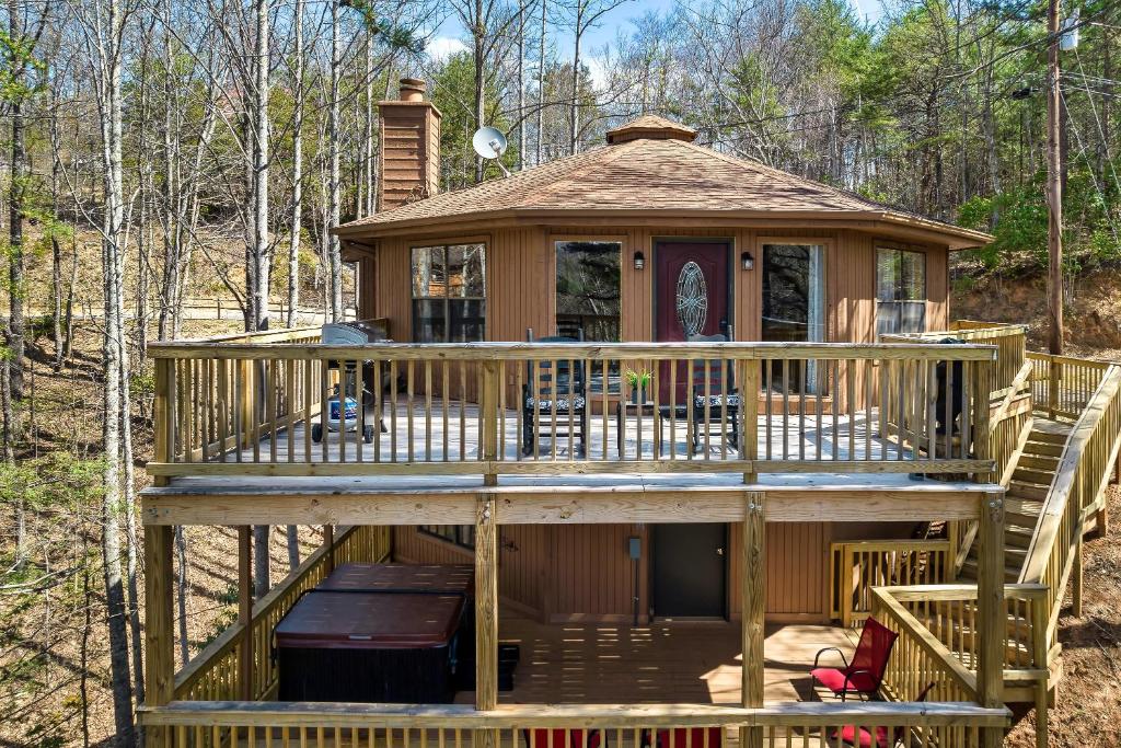 a large wooden gazebo in the woods at Gnoming Around in Gatlinburg