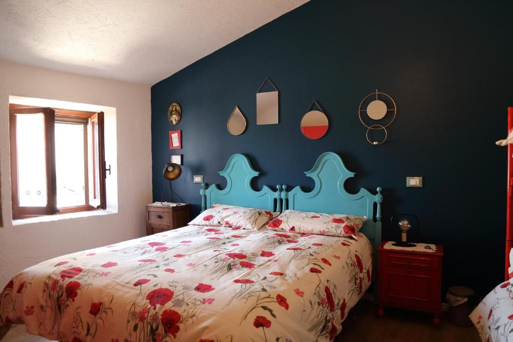 A bed or beds in a room at Casetta Nonna Augusta (Spello 9 km-Assisi 12 km)