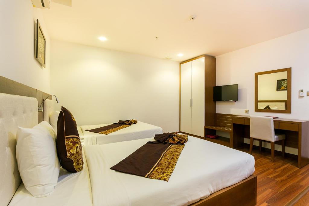 TV a/nebo společenská místnost v ubytování Centre Hotel