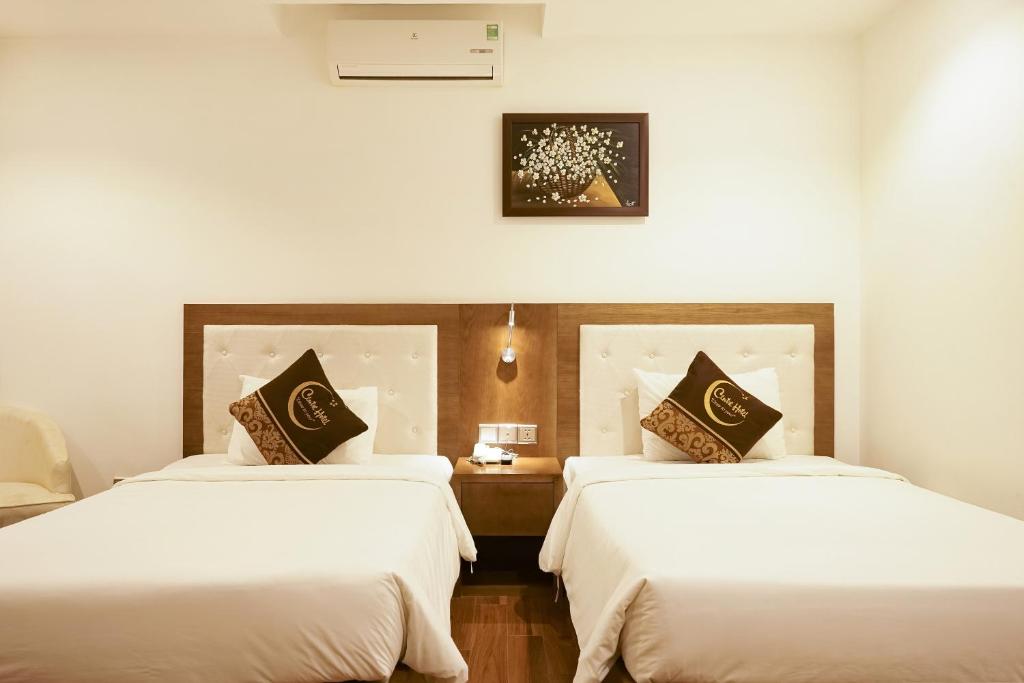Postel nebo postele na pokoji v ubytování Centre Hotel