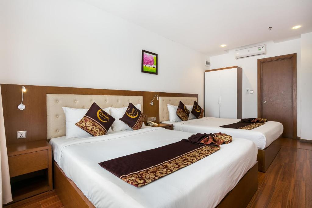 Postel nebo postele na pokoji v ubytování Centre Hotel