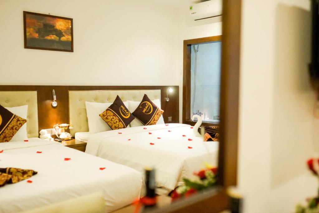Postel nebo postele na pokoji v ubytování Centre Hotel