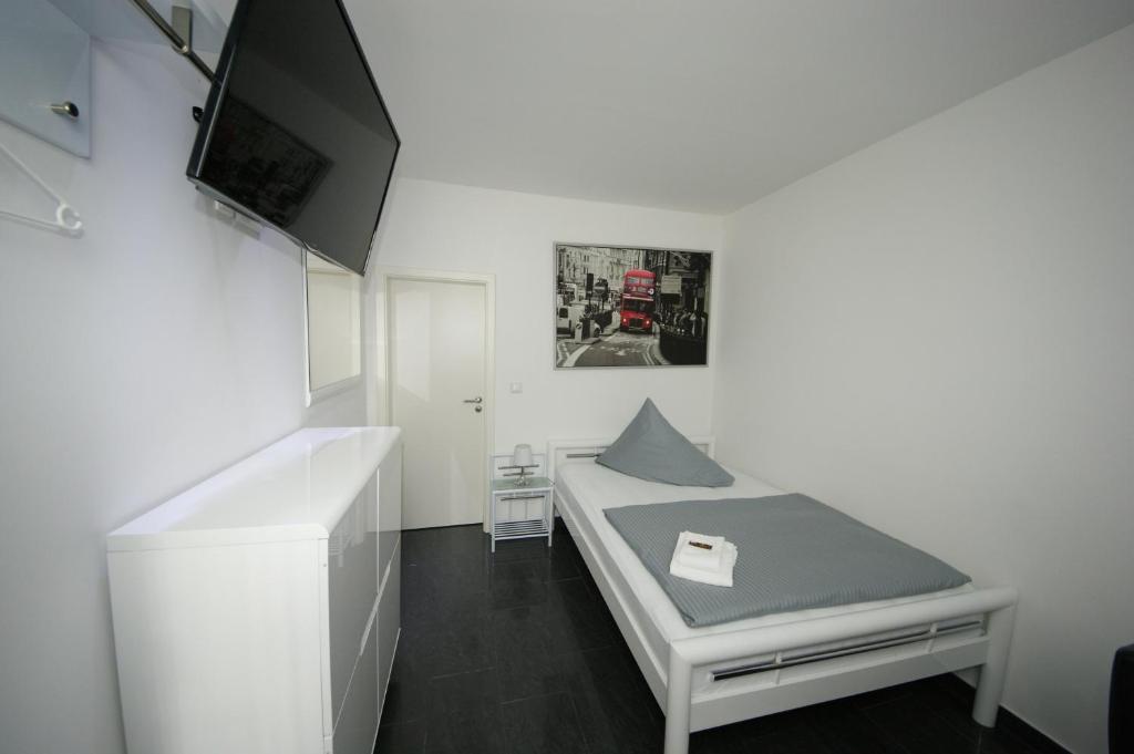 Postel nebo postele na pokoji v ubytování Hotel am Rosenplatz,24 Stunden Check in, kostenfreie Parkplätze
