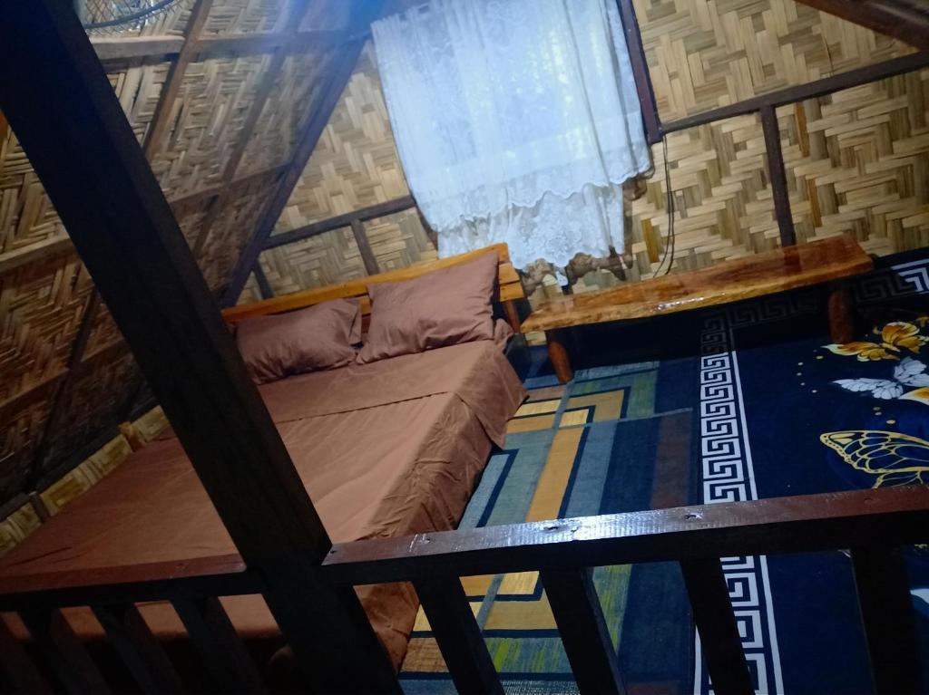 Posezení v ubytování Weeroona Huts Homestay Pacifico