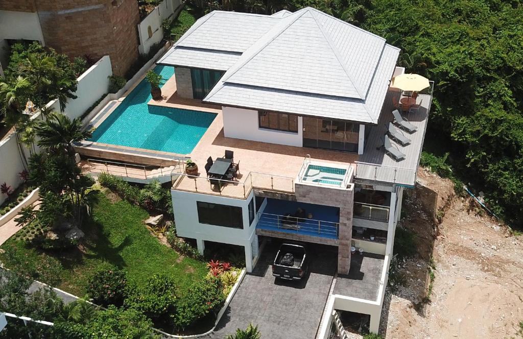 an overhead view of a house with a swimming pool at Tropical Villa 1 in Lamai