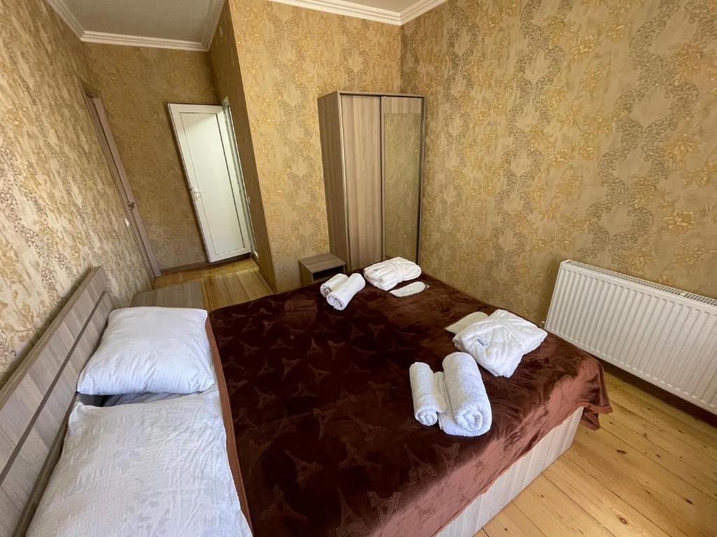Postel nebo postele na pokoji v ubytování Hotel Garbani