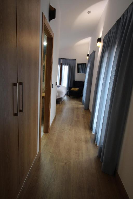 Postel nebo postele na pokoji v ubytování HOTEL MIRADOR DE ALEDO