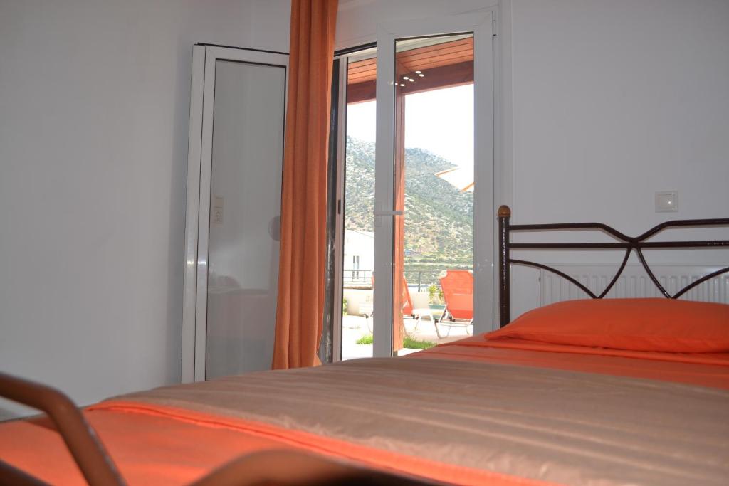 Postel nebo postele na pokoji v ubytování Bali House