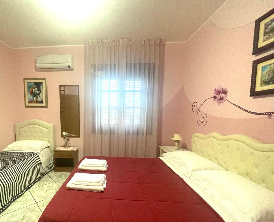Posteľ alebo postele v izbe v ubytovaní B&B Villa Ciccone