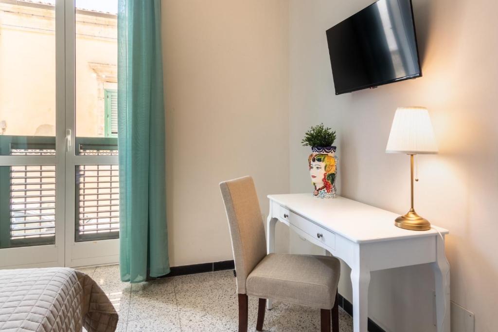 TV a/nebo společenská místnost v ubytování Guest House Aurispa