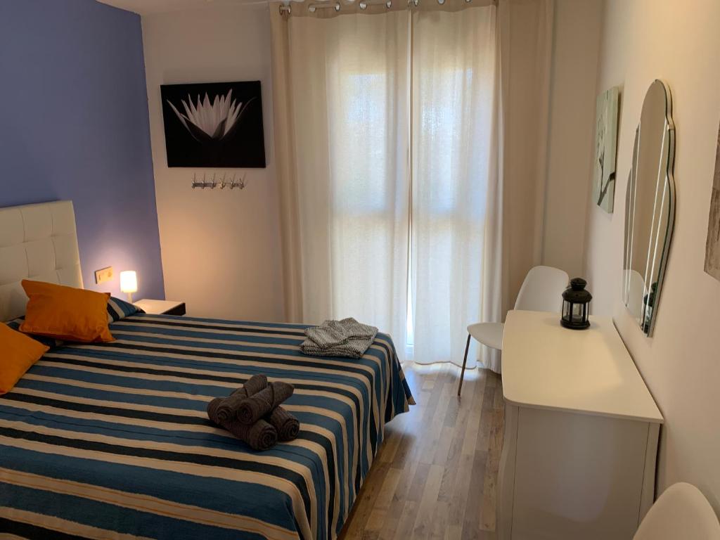 A bed or beds in a room at Mas Pinell 3 -Viu bé